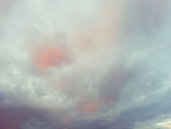 Low angle view of cloudy sky during sunset