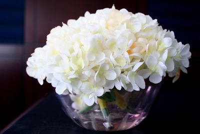 Close-up of flower vase on table