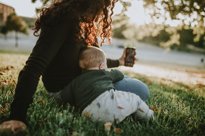 Woman taking selfie with son