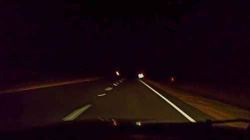 Cars moving on road at night