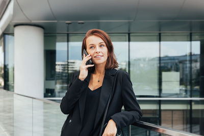 Young woman using mobile phone