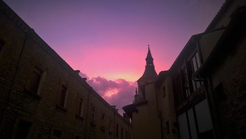 View of buildings at sunset