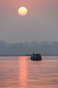 Scenic view of sea against sky during sunrise