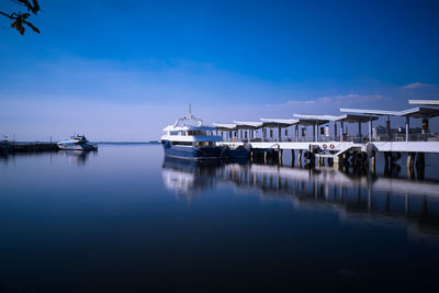 Boats moored in marina