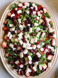 High angle view of chopped vegetables in bowl on table