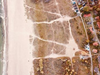 Water flowing through rocks against wall