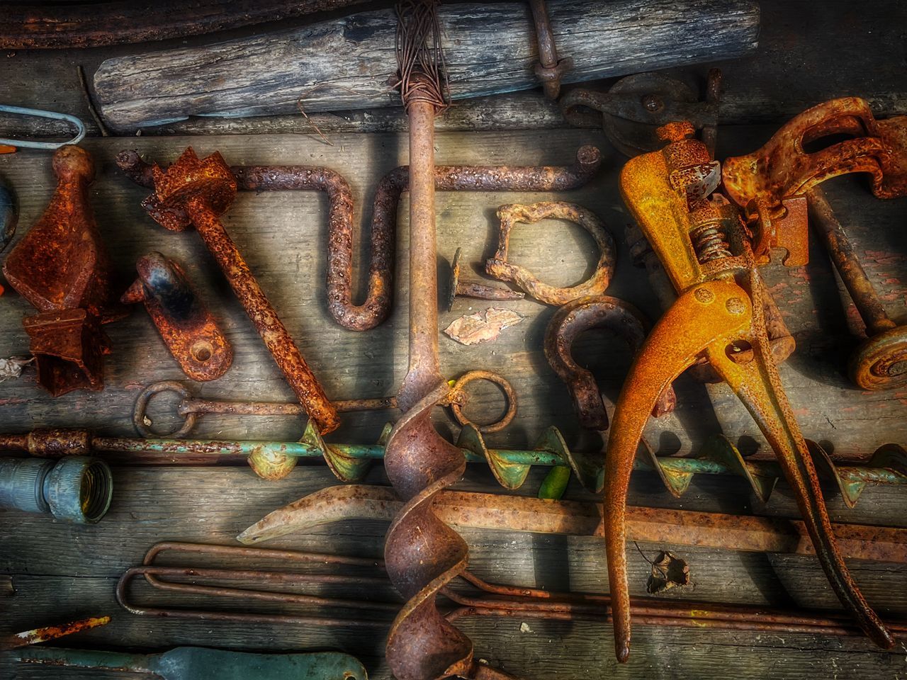 wood, iron, metal, rusty, painting, no people, art, indoors, work tool, still life, variation, old, large group of objects, equipment, ancient history, high angle view, workshop