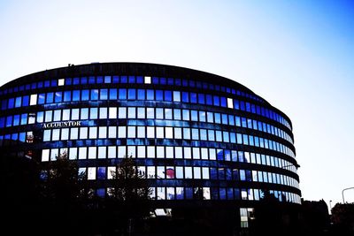 Low angle view of modern building against clear sky