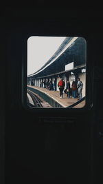 Woman at railroad station