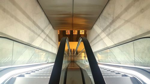 Interior of illuminated escalator