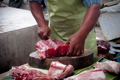 Butcher at local market