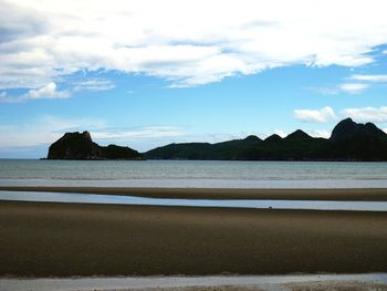 Scenic view of beach against sky