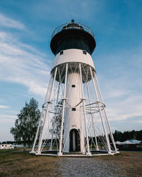 Low angle view of water tower against sky