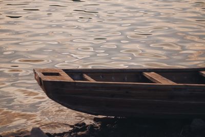 High angle view of boat moored in water