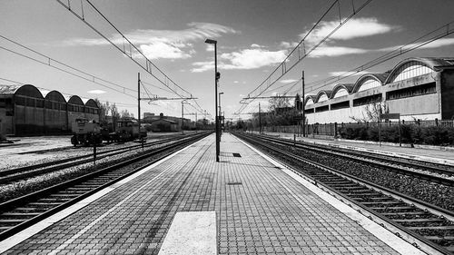 Railroad tracks on railroad station platform