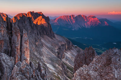 Scenic view of mountains against sky during sunset