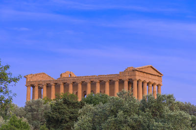 Low angle view of temple against sky