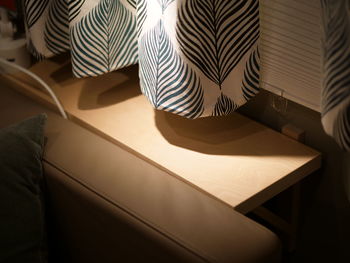 High angle view of shadow on bed at home