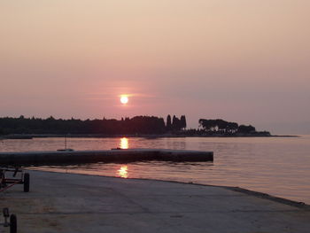 Scenic view of sea at sunset