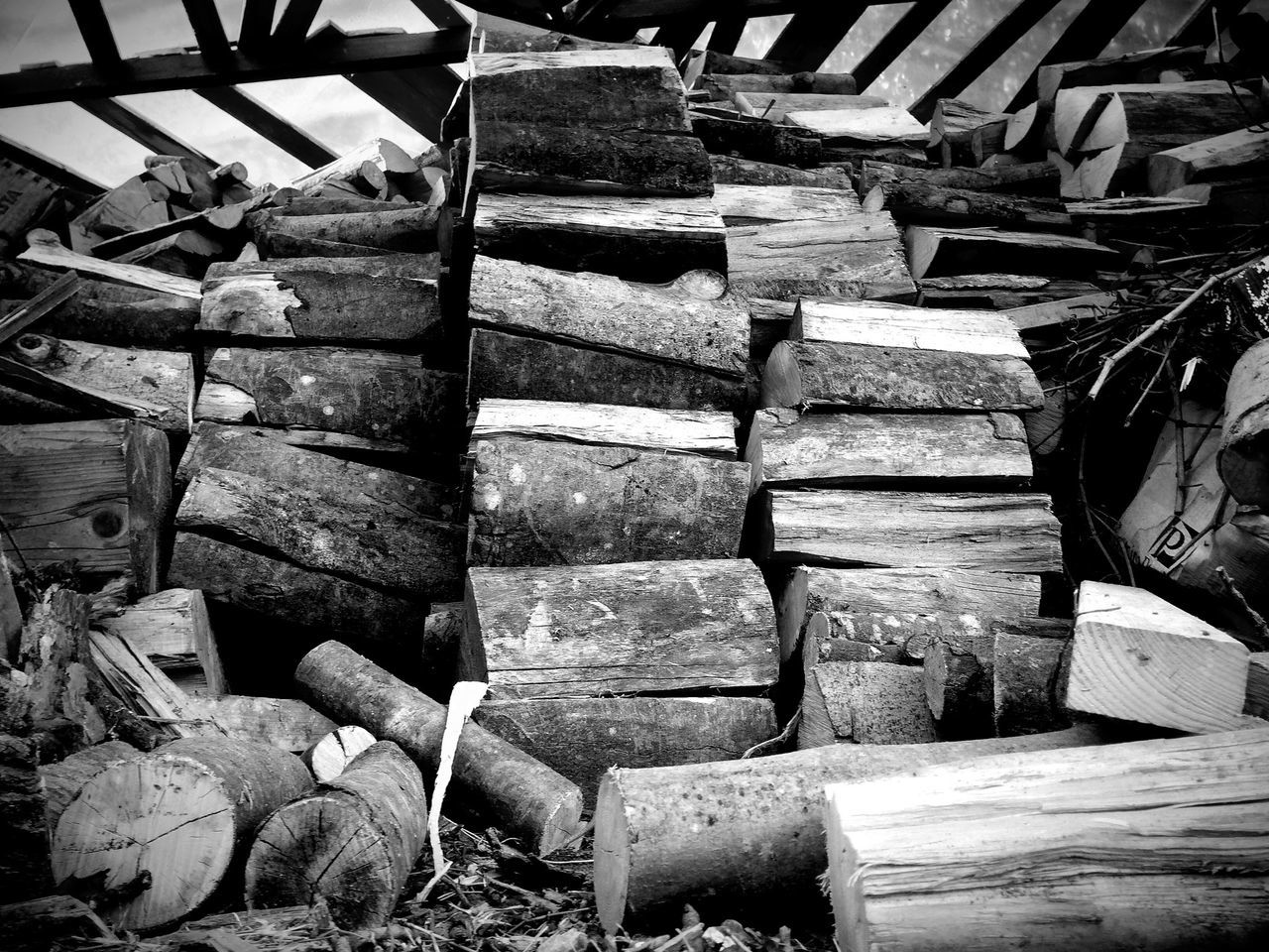 wood - material, stack, large group of objects, firewood, wooden, log, lumber industry, abundance, in a row, steps, old, wood, timber, deforestation, textured, abandoned, close-up, no people, day, stone wall