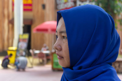 Close-up portrait of boy looking away