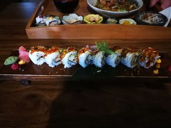 Close-up of sushi served on table