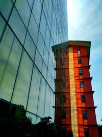 Low angle view of modern buildings against sky