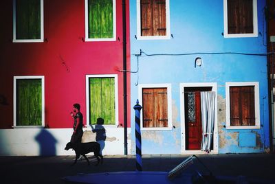 Woman sitting on window