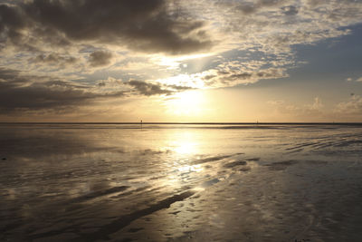 Scenic view of sea at sunset