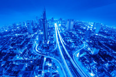 High angle view of illuminated cityscape at night