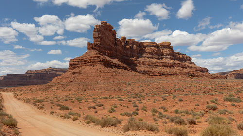 Low angle view of rock formations against sky
