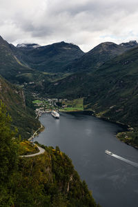 View of the geirangerfjord with a cruise ship in the port of the small geiranger town