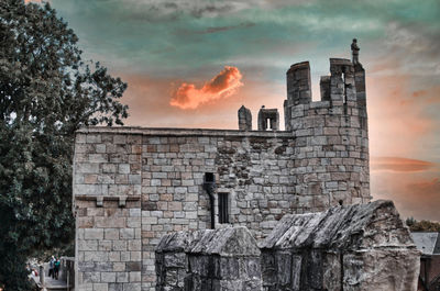 Old ruin building against sky during sunset