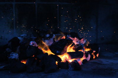 Close-up of bonfire outdoors at night