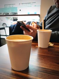 Close-up of coffee cup on table