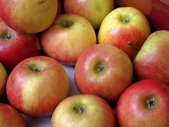 Full frame shot of apples on table