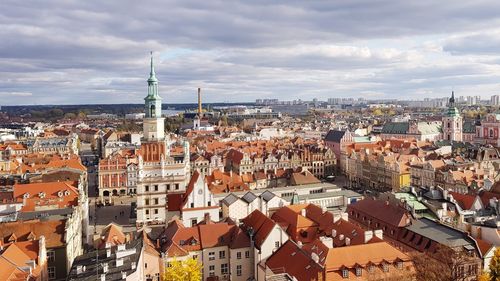 High angle view of townscape against cloudy sky