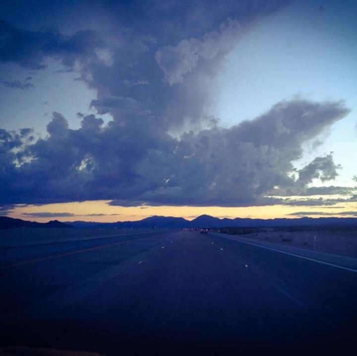 ROAD AMIDST LANDSCAPE AGAINST SKY