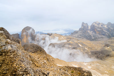 Scenic view of rocky mountains against sky