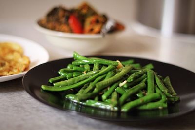 Close-up of saute green beans in plate