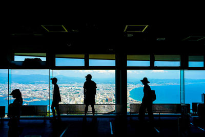 Silhouette people at airport