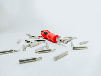 High angle view of objects against white background