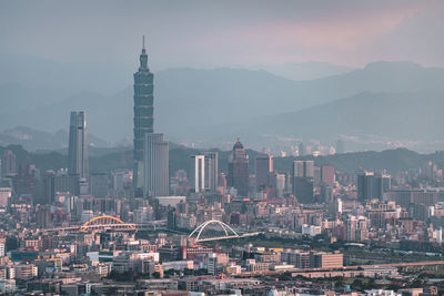 Modern buildings in city against sky