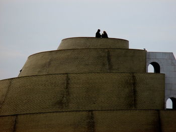 Low angle view of built structure against clear sky