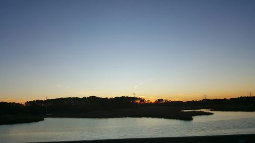 Scenic view of sea at sunset