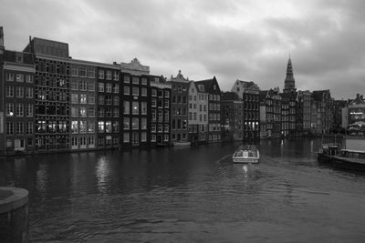 Buildings in city against sky