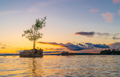 Scenic view of sea against sky during sunset