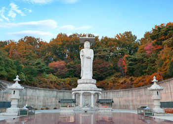 Statue in front of building