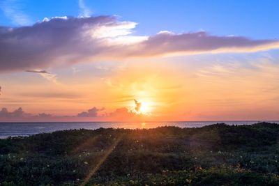 Scenic view of sunset over sea