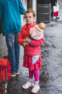 Full length portrait of a smiling girl